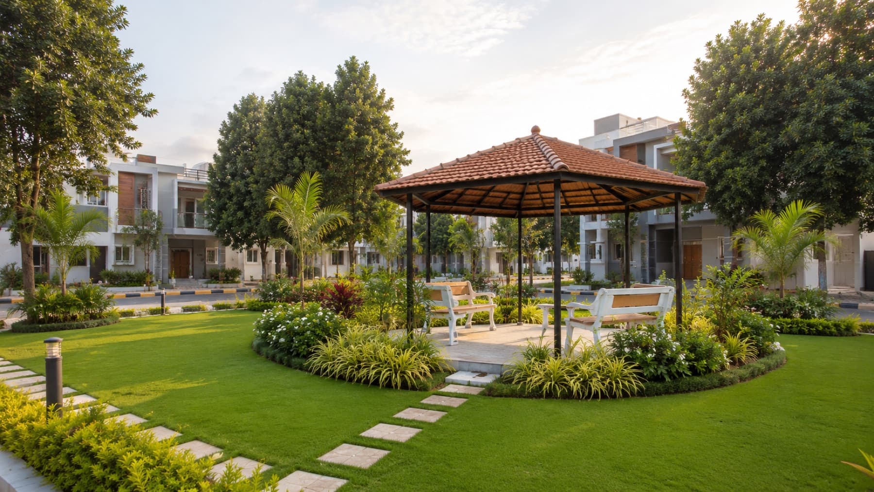 Landscaped garden pavilion inside a Medhyam Dwellings community