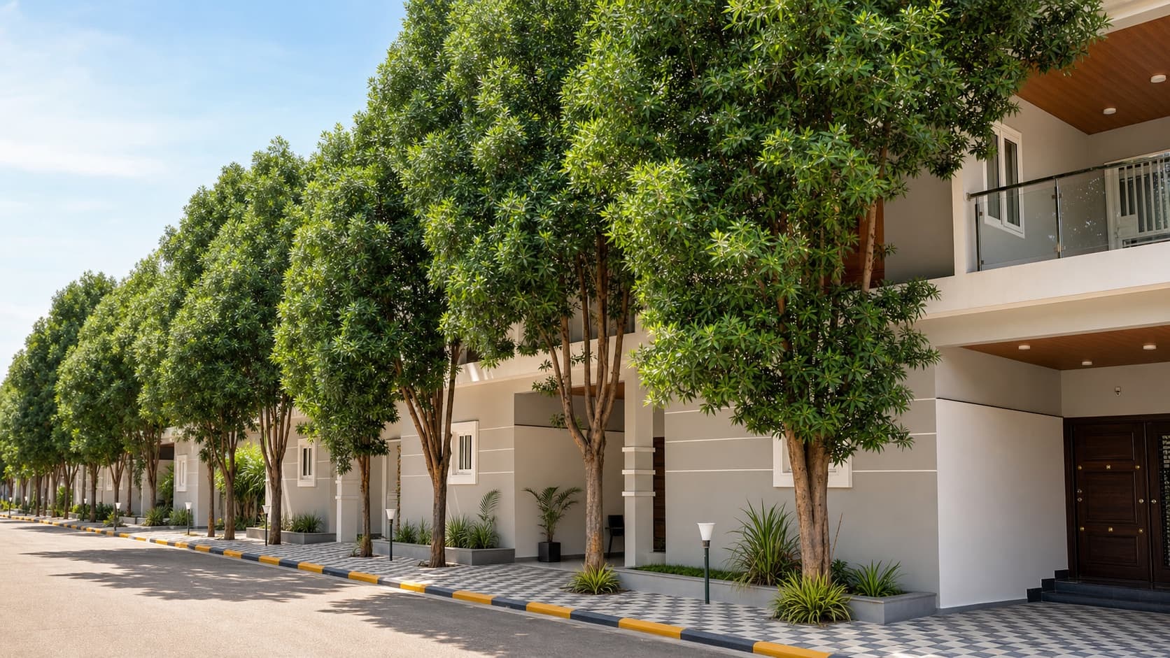 Tree-lined internal villa lane at Serenity Highland